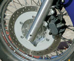 The single disc up front slows the down bike without fanfare.